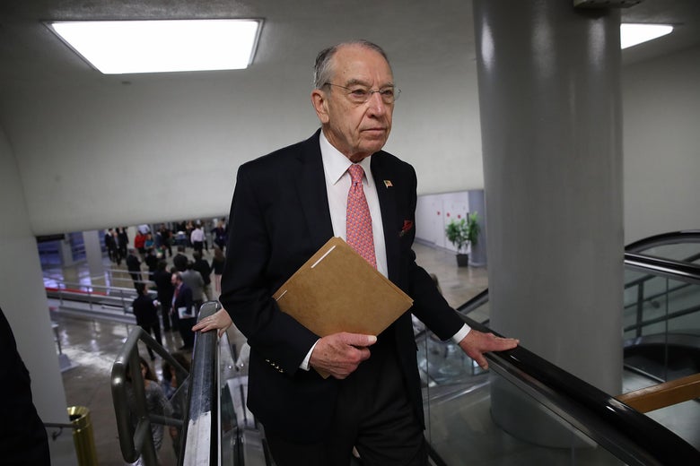 Chuck Grassley walks to the Senate chamber for a vote after the Judiciary Committee voted 14-7 to advance legislation designed to protect special counsel Robert Mueller's investigation.